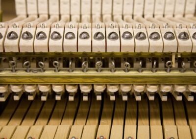 the inside mechanism of a piano
