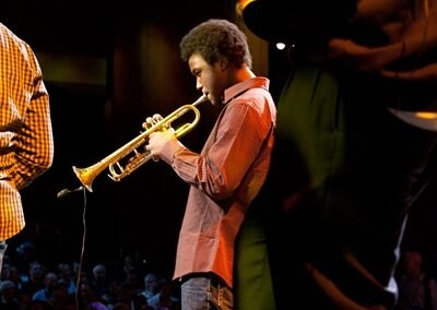 A trumpet player from the TED House Band